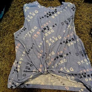 This shirt is blue black pink and white it’s a large (12)